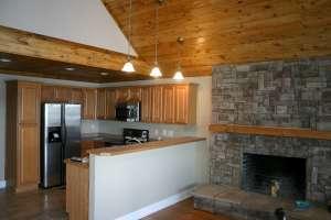 View of kitchen and fireplace