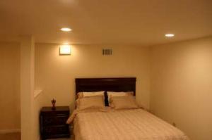 Large bedroom downstairs with bunk room