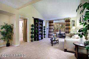 living room with vaulted ceiling