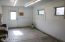 Enclosed shop at back of Garage