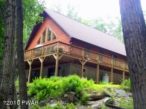 Lakefront,Gentle slope to lake with incredible views. Master Suite plus 3 additional Bedrooms