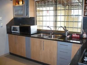 MASTER INTERNATIONAL Casa en Venta en Los Lirios en Palo Negro C&oacute;digo: 11-5696 No.3